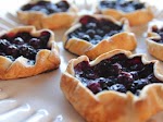 Mini Blueberry Galettes was pinched from <a href="http://www.foodnetwork.com/recipes/ree-drummond/mini-blueberry-galettes.html" target="_blank">www.foodnetwork.com.</a>