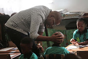 Itumeleng Lesele bids farewell to his son Mickyle Steyn on his first day of school at Melpark Primary school.