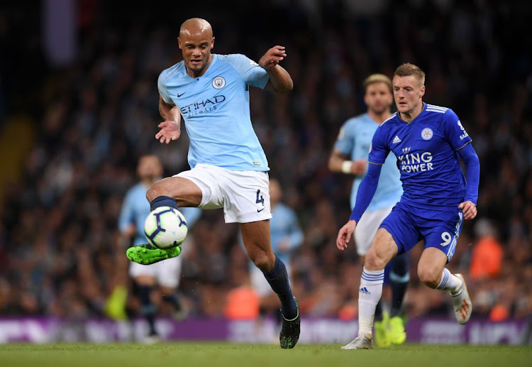 Vincent Kompany of Manchester City controls the ball during the Premier League match against Leicester City at Etihad Stadium on May 06, 2019 in Manchester, United Kingdom.