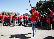 Workers affiliated with the National Union of Metalworkers of South Africa during their strike for better wage increases at the Bellville South community centre in Cape Town on 05 October 2021. 
