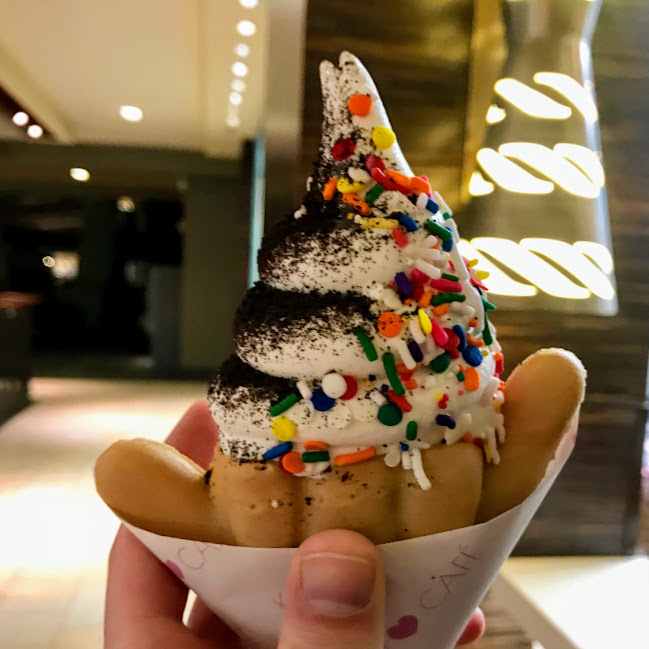 Shaka-Boom cone with vanilla soft-serve, chocolate sauce, Oreo cookie dust, and sprinkles, Kokoro Cafe