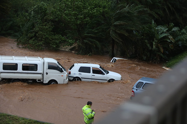 Vehicles stuck in high storm water in Prospecton Road, south of Durban on October 10, 2017.