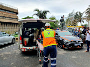 The man who fell from a high-rise building was taken to hospital for urgent medical care.