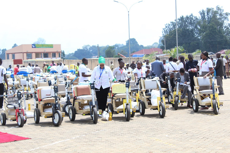 Some of the assistive devices given to people living with disabilities by the Kakamega County government on Friday