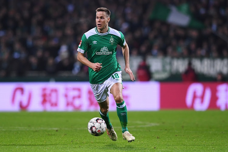 Niklas Moisander of SV Werder Bremen runs with the ball during the Bundesliga match between SV Werder Bremen and TSG 1899 Hoffenheim at Weserstadion on December 19, 2018 in Bremen, Germany.