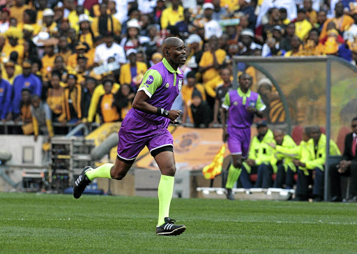 Referee Thando Ndzandzeka wears the controversial OUTsurance kit during the Carling Black Label match between Orlando Pirates and Kaizer Chiefs. /Veli Nhlapo