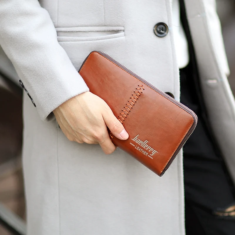 Leather Men's Clutch Bag Multifunctional Wallet. Stylish and practical, offering ample space and organization for the mo