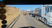 Truckers wait in long queues to cross into Zimbabwe at Beitbridge border post since the lockdown started. 