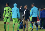 Platinum Stars' head coach Cavin Johnson talks to his players during the Absa Premiership match against Maritzburg United at Harry Gwala Stadium on May 10, 2017 in Durban, South Africa.