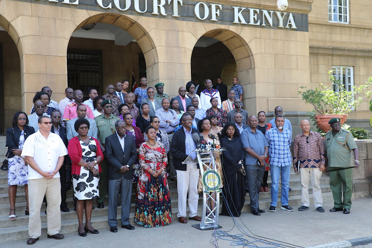 Senior members of the Judiciary led by Chief Justice David Maraga outside the Supreme Court on March 15, 2020.