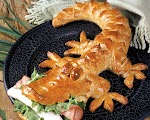 Baby Alligator Bread | Cajun Cooking Recipes was pinched from <a href="http://cajuncookingrecipes.com/wordpress/recipes/bread-2/baby-alligator-bread-3/" target="_blank">cajuncookingrecipes.com.</a>