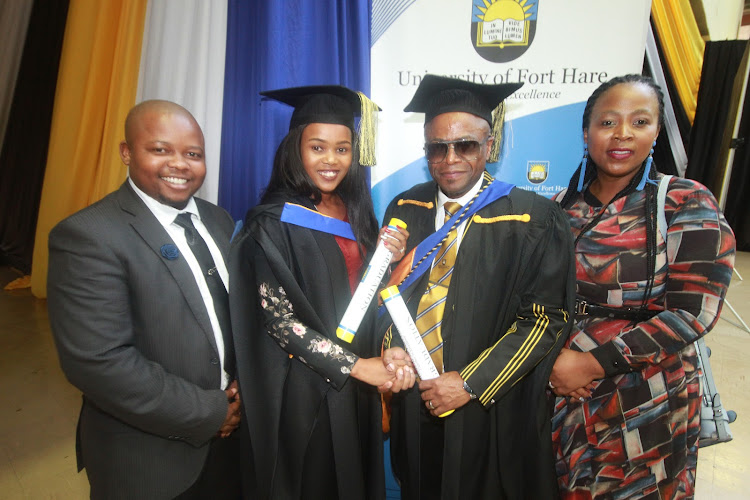 AbaThembu acting queen Usikhumbulile Dalindyebo and AmaRharhabe spokesperson Prince Zolile Burns-Ncamashe graduated from Fort Hare University in Alice on Wednesday. Far left is AbaThembu acting king Azenathi Dalindyebo and far right, Burns-Ncamashe's wife Nkosikazi Nozindzile Burns-Ncamashe.