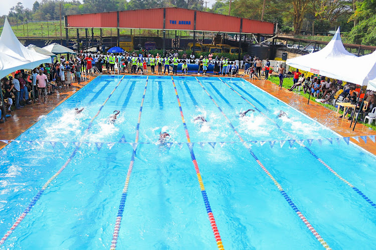 Swimming action during the masters championship at Potterhouse school in Runda