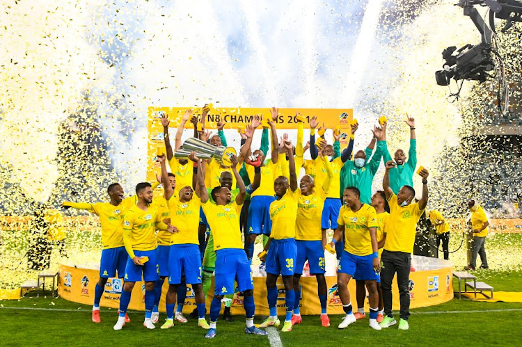 Mamelodi Sundowns players celebrate winning the MTN8 final against Cape Town City at Moses Mabhida Stadium on October 30, 2021 in Durban, South Africa.