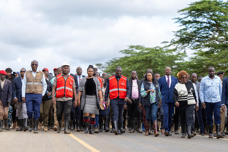 President William Ruto accompanied by other leaders when he visited Mai Mahiu landslide victims on April 30, 2024.