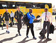 Manqoba Mngqithi, assistant coach of Mamelodi Sundowns and Zakhele Siwela arrives during the 2018 MTN8 quarter finals match between Mamelodi Sundowns and Golden Arrows at Lucas Moripe Stadium, Pretoria on 11August 2018.