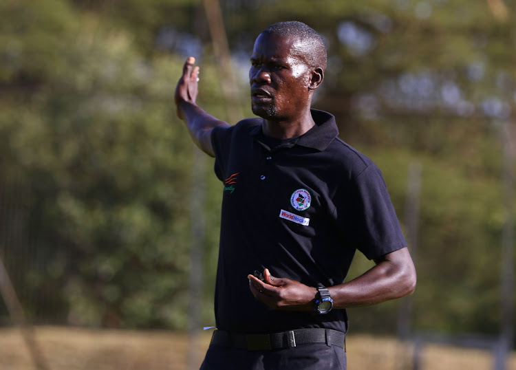 Hockey umpire Peter Obalo reacts during a KHU Premier League match