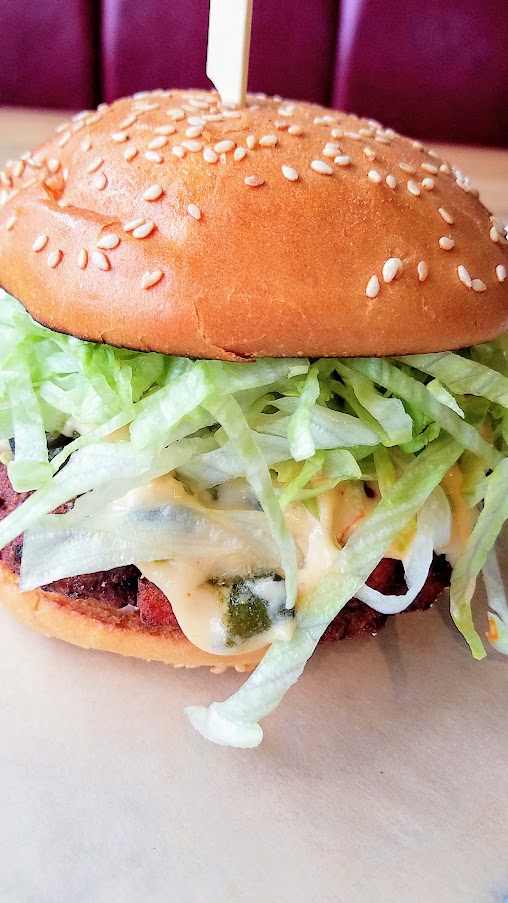 Bunk Bar at Water Ave, evenings only vegetarians (and it can also be made vegan) can get a black bean burger that still delivers on flavor thanks to roasted green chilies, pepper jack, avocado, mayo, hot sauce, and shredded lettuce