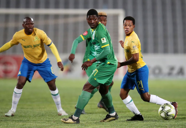 Sphelele Mkhulisi of Mamelodi Sundowns, right, is challenged by Manuel Kambala of Baroka FC during the Absa Premiership match between the two sides.