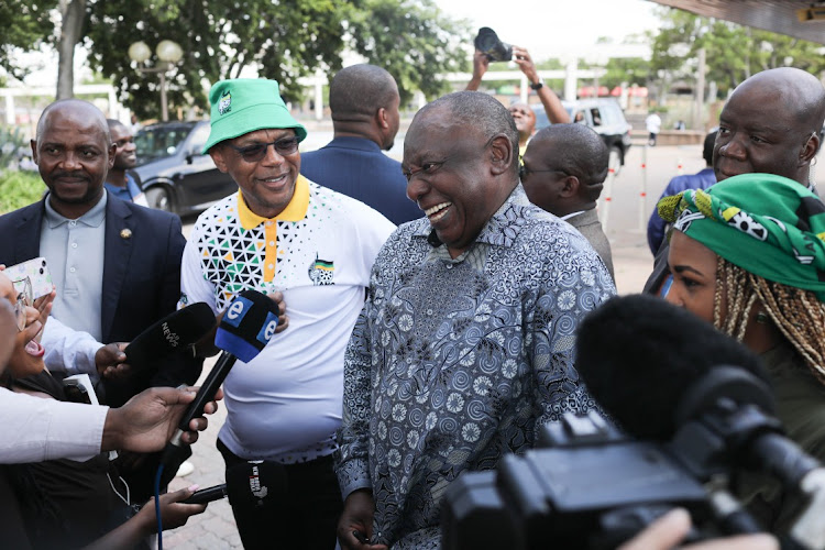 President Cyril Ramaphosa shares a lighthearted moment with journalists after leaving the venue where the National Working Committee meeting of the ANC is taking place, 04 December 2022, at Nasrec in Johannesburg. Ramaphosa recused himself from the meeting so that members of the NWC can deliberate on issues relating the Phala Phala farm scandal.