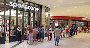 Queues of shoppers at Mall of Africa early on Friday.