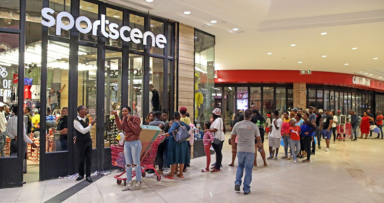 Queues of shoppers at Mall of Africa early on Friday.