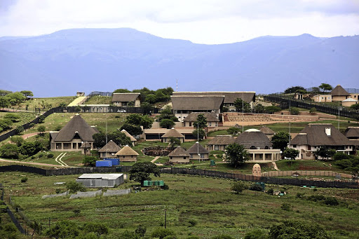 Jacob Zuma's homestead in Nkandla has been compared to Robert Mugabe's blue roof mansion.