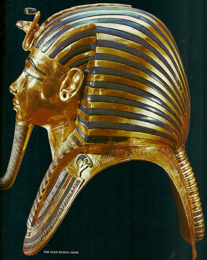 The golden burial mask of King Tutankhamen, from about 1323 BC, at the Egyptian Museum.