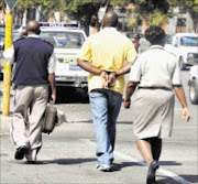 NABBED: Odera Ekwunife with immigration officials Lydia Motene and Blackie Mogashoa after he was arrested at OR International Airport. Pic: Elijar Mushiana. 14/04/2010. © Sowetan.


ABOVE LAW: A handcuffed Nigerian Odera Ekwunife, 40, husband of magistrate Mary Mokone was arrested by the Polokwane Immigration officers, Lydia Motene, right and Blackie Mogashoa, left, for allegedly fake a marriage certificate. He briefly appeared in Polokwane Magistrate Court.