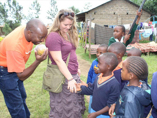 HELP AT LAST: Can Do Kids NGO officials with children at Upendo Children’s Home in Murang’a yesterday.