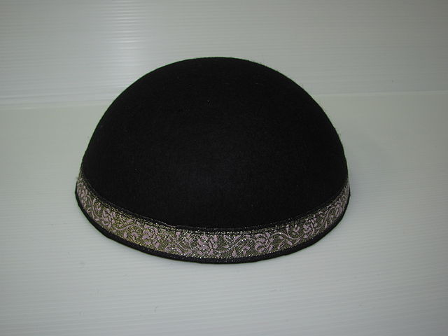 Black velvet kippah with embroidery.