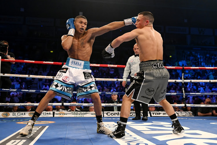 Ludumo Lamati punches Nick Ball during the Featherweight fight at The SSE Arena Belfast on May 27, 2023