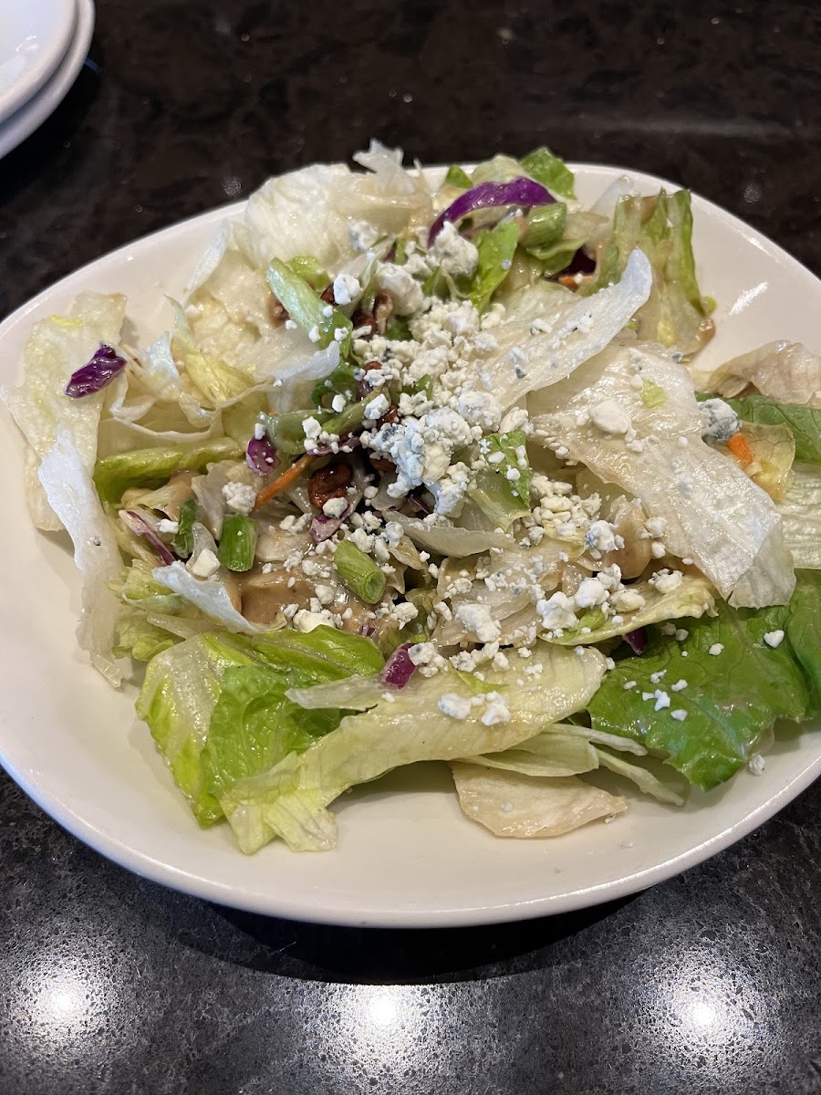 Bleu cheese pecan side salad, ask for no aussie crunch and it will be GF