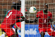 Katleho Makateng of Lesotho picks the pall put of the net after scoring in his team's Cosafa Cup Group B match against Lesotho at King Zwelithini Stadium in Durban on July 6 2022.