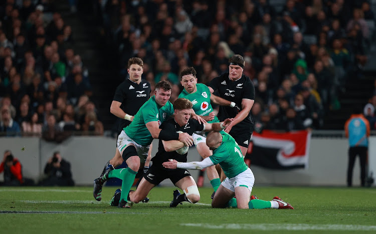 Jordie Barrett is supported by his brother during the International test match in the series between the New Zealand All Blacks and Ireland at Eden Park on July 2 2022 in Auckland, New Zealand. Picture: GETTY IMAGES/GREG BOWKER (Photo by Greg Bowker/Getty Images for Altrad)