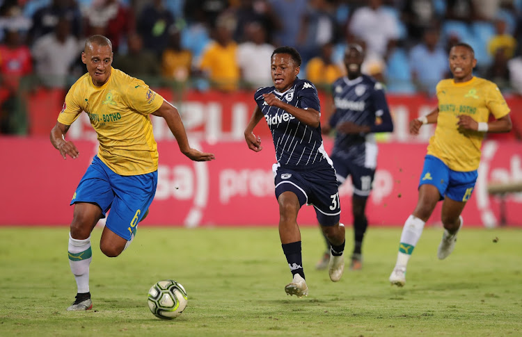 Rowan Huma of Bidvest Wits challenged by Wayne Arendse of Mamelodi Sundowns during the Absa Premiership 2019/20 match between Mamelodi Sundowns and Bidvest Wits at Loftus Versfeld Stadium, Pretoria, on 07 January 2020.