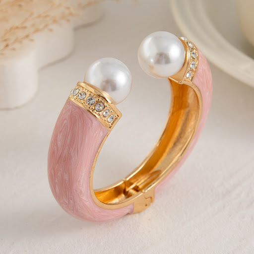 Title 6, Fashion Dopamine Pearl Spring Bracelet. Elevate...
