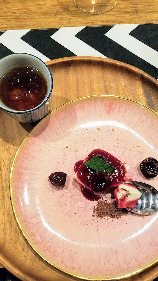 Nodoguro Twin Peaks themed dinner, Damn Fine Cherries and Tea, Soy cheesecake topped with cherry jam, cherries poached in Whiskey, alongside chocolate crumbles and sprinkled with a little buckwheat. Served with Iced Hōjicha Tea, a roasted green tea