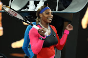 Serena Williams of the United States celebrates winning her Women's Singles Quarterfinals match against Simona Halep of Romania during day nine of the 2021 Australian Open at Melbourne Park on February 16, 2021 in Melbourne, Australia.