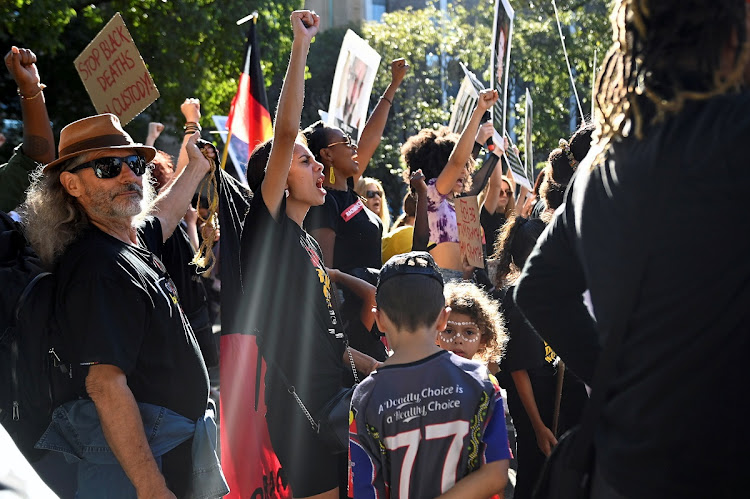 Protesters rally to mark a national day of action, protesting against aboriginal deaths in police custody, in Sydney, Australia.