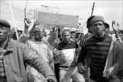 ANGERED: Gautrain workers during a protest in Sandton yesterday. Pic. Thobeka Ndabula. 25/09/07. © Sowetan.