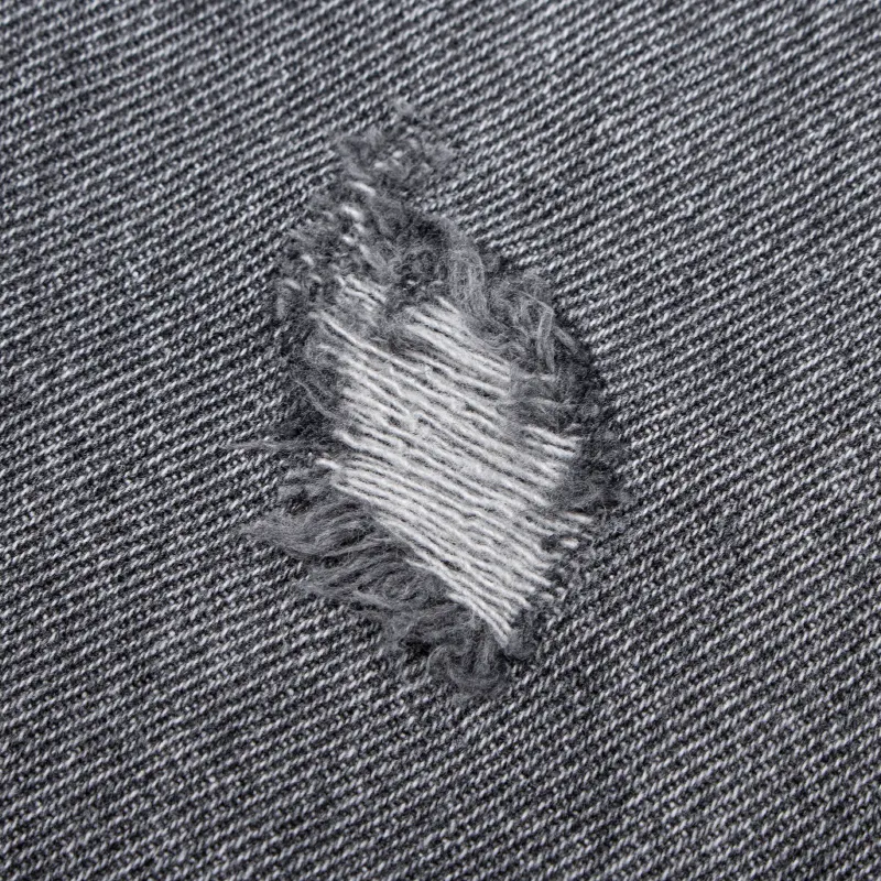 Jeans de mujer de talle alto con roturas y abertura en el bajo, estilo moderno para un look favorecedor y cómodo, perfectos para cualquier ocasión.