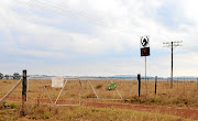 The entrance to  Andries Terreblanche's farm at Nooitgedacht,  about 40km outside Ventersdorp, where the 84-year-old worked his entire life as  a farm hand. 