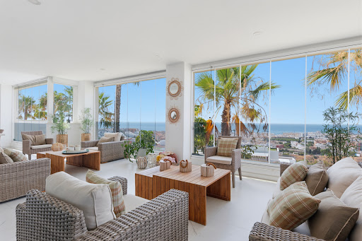 Property purchase in Estepona (Spain) - Modern living room with panoramic sea view