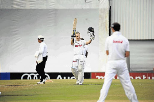TAKE A BOW: Dolphins star Morne van Wyk saluting the locker room after scoring his ton Picture: MARK ANDREWS