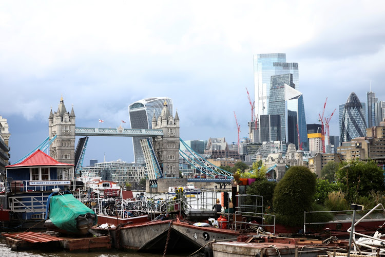 Tower Bridge is seen stuck in the open position, due to a technical fault, in London, Britain, August 9, 2021.