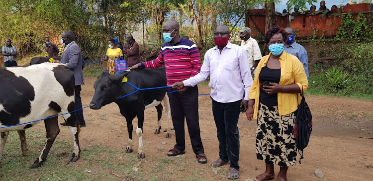 Kisumu Agriculture executive Gilchrist Okuom during distribution of dairy animals to farmers at Masogo/Nyang’oma ward in Muhoroni