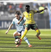 Dominique Bloodworth of Netherlands and Thembi Kgatlana of Banyana during their match on Saturday. /Gallo Images