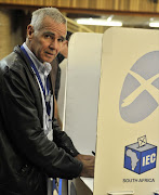 Chris Hattingh, DA candidate in the North West province, at a voting station his vote in the municipal elections.