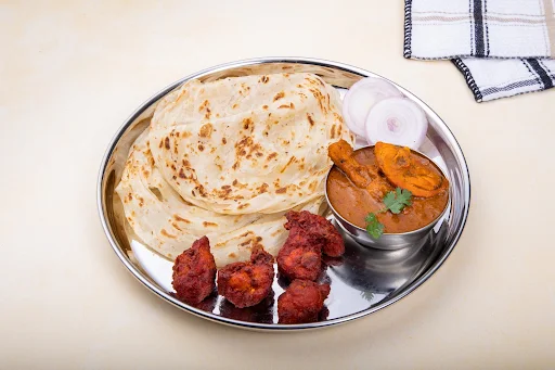 Kerala Parotta (2 Pcs) + Chicken Kebab (4 Pcs) + Chicken Masala